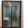 Cửa đi mở trượt nhôm xingfa 2 cánh màu nâu đen